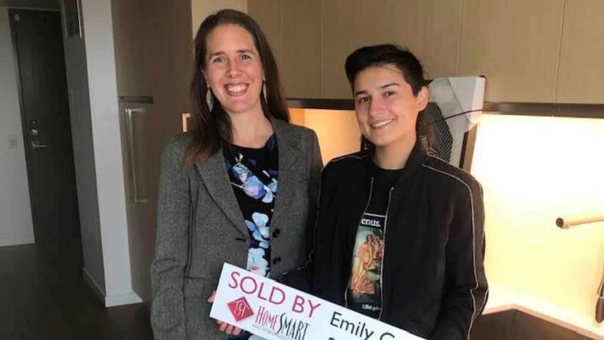 Happy home buyers celebrating closing day in the Seattle area
