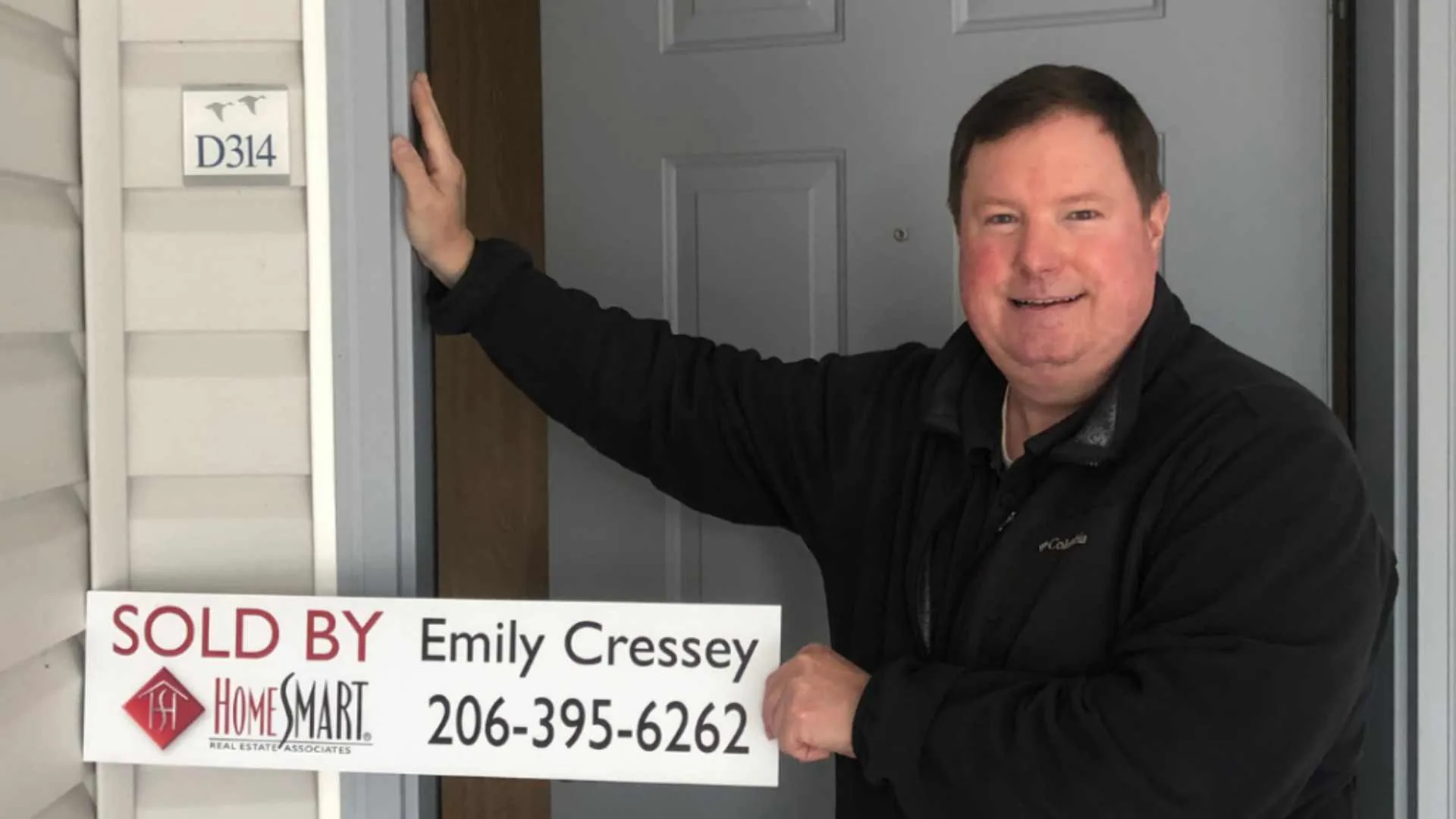 Home buyers reviewing closing costs at their Edmonds WA home purchase