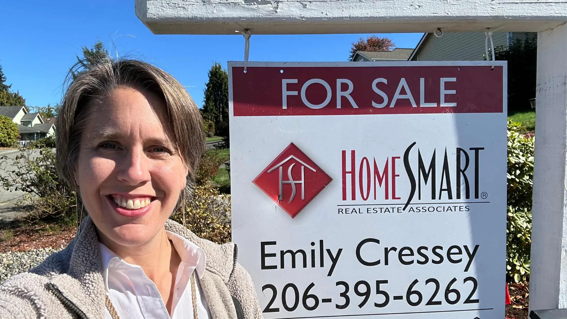 Buyers signing paperwork and paying closing costs in Edmonds WA