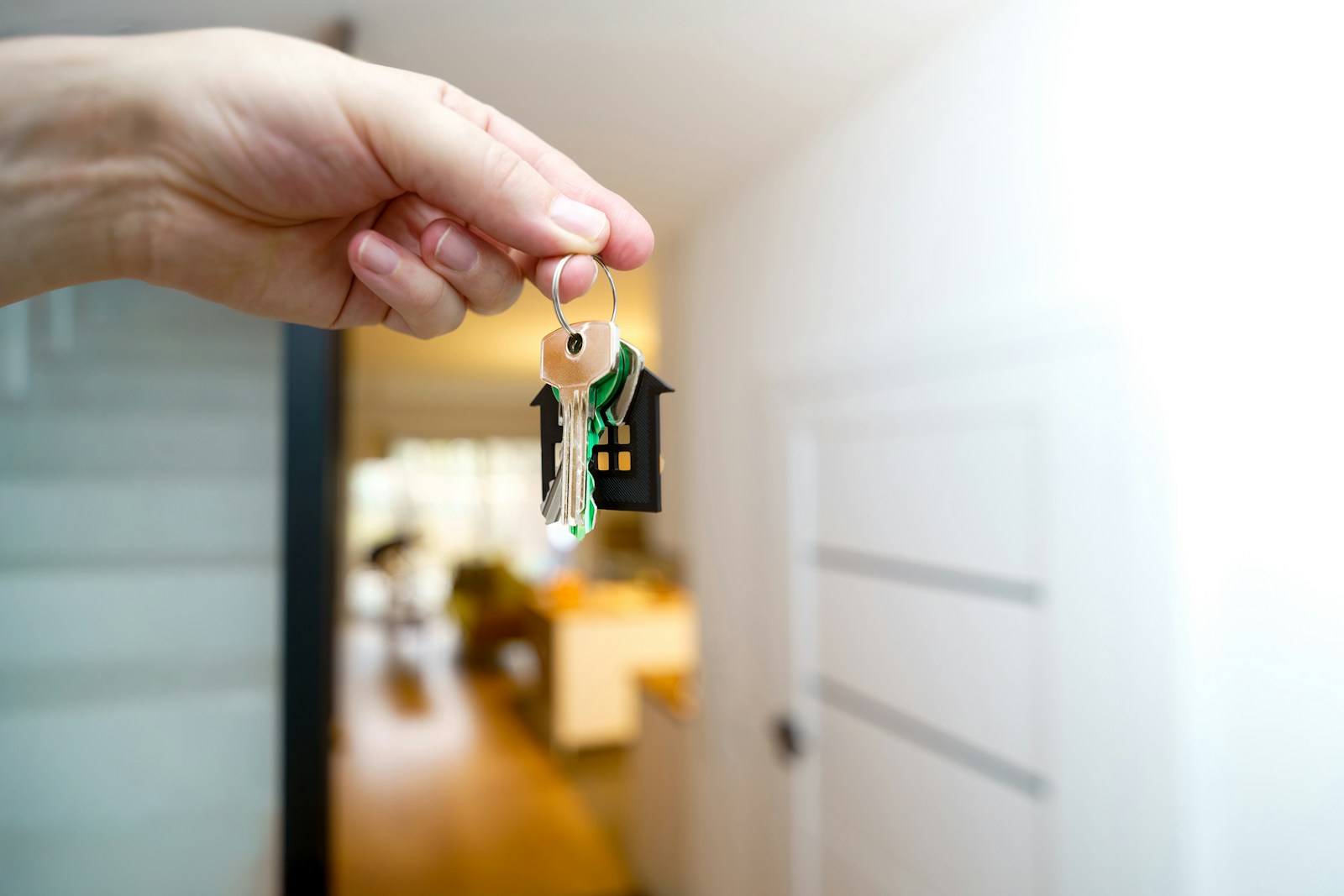 New homeowner receiving keys to a newly built Seattle home
