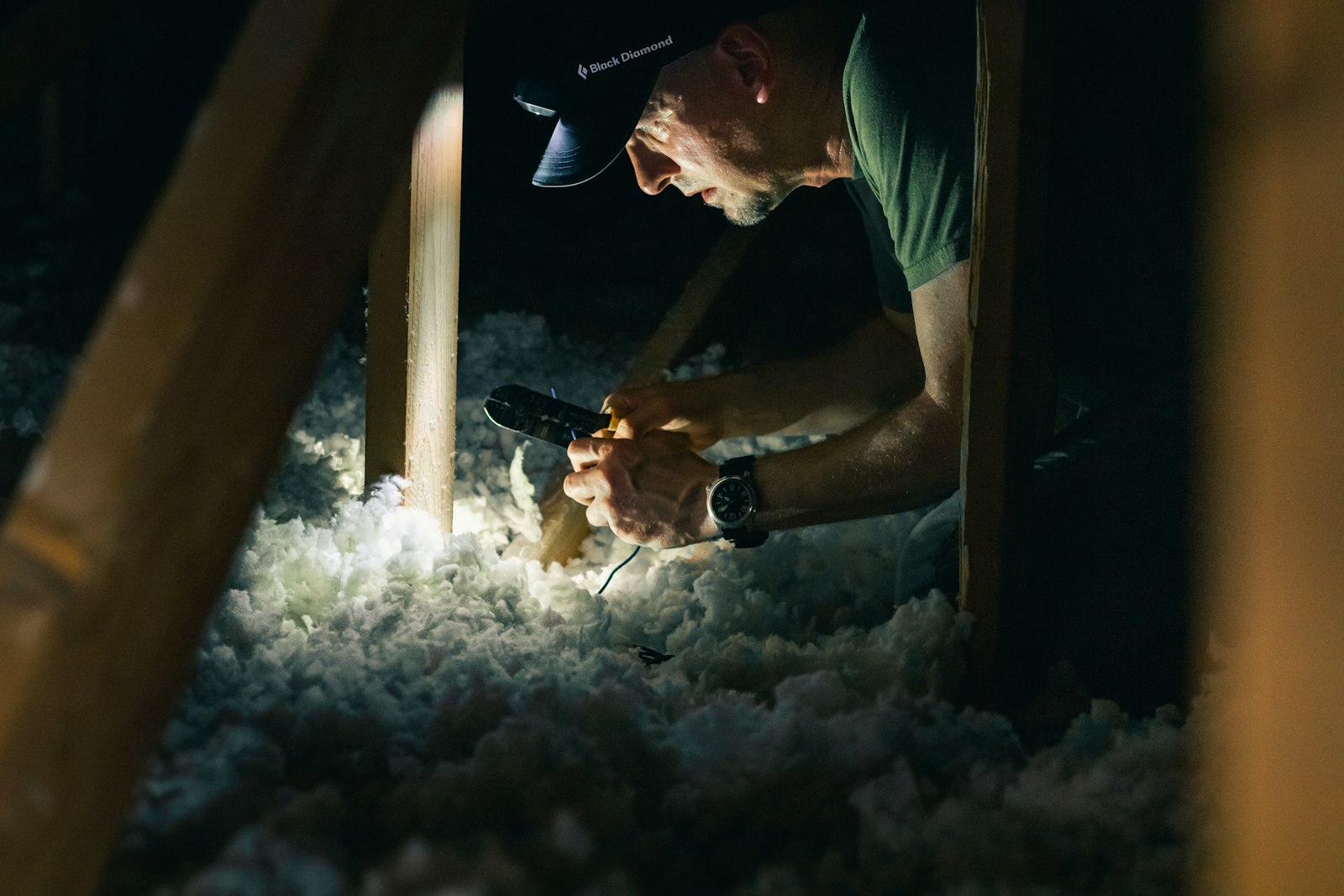 Home inspector examining the attic of an older Shoreline, WA home